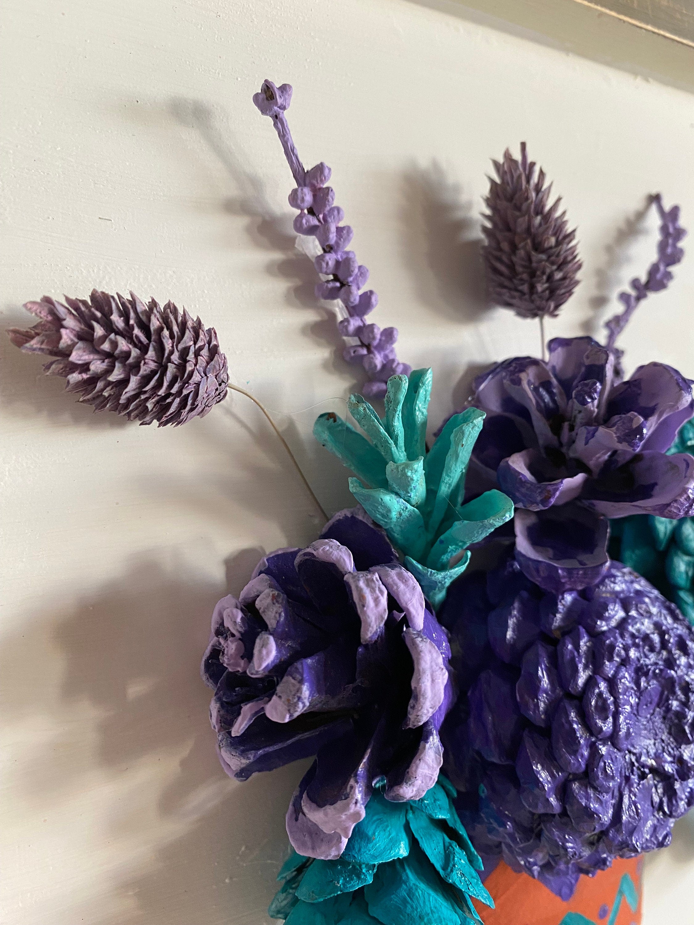 Wall Hanging - Pine Cone Flowers in Terra Cotta Pot - Purple, Aqua & Turquoise Flowers with dried flower accents navajo design