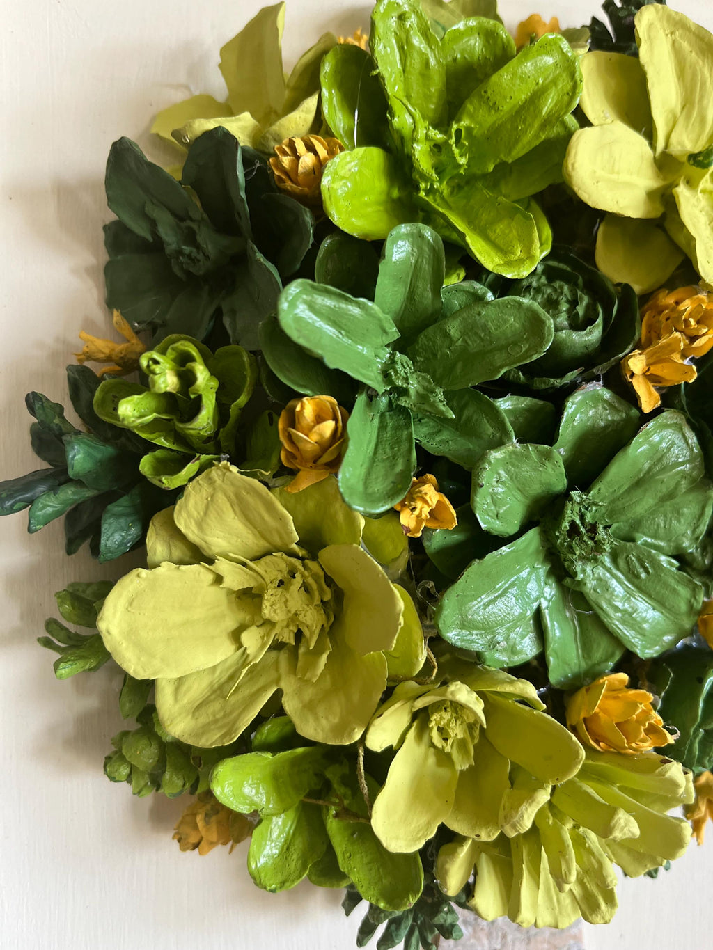 Wall Hanging Hand Painted Pine Cones Tree with in shades of green with yellow flowers - frame is cream colored and is real wood